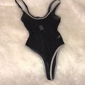 Sheer black bodysuit